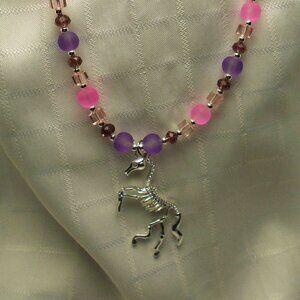 No121 Beautiful handmade long necklace with silver unicorn pendant & earrings
